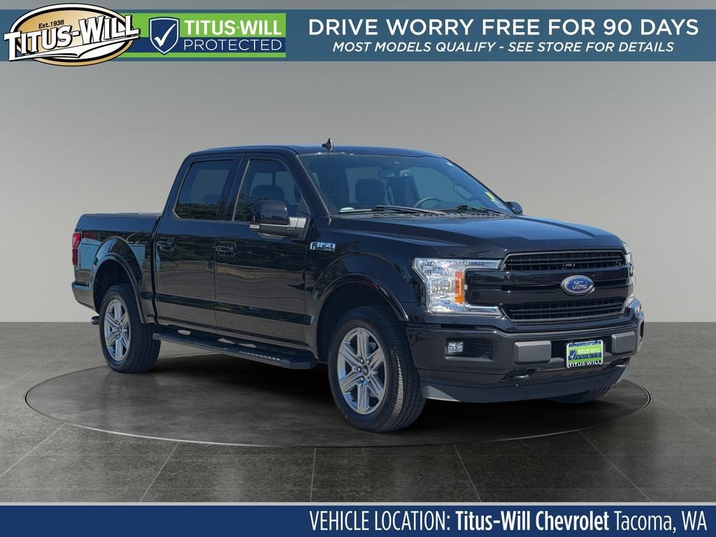 2019 Ford F-150 LARIAT in Black — front three-quarter view