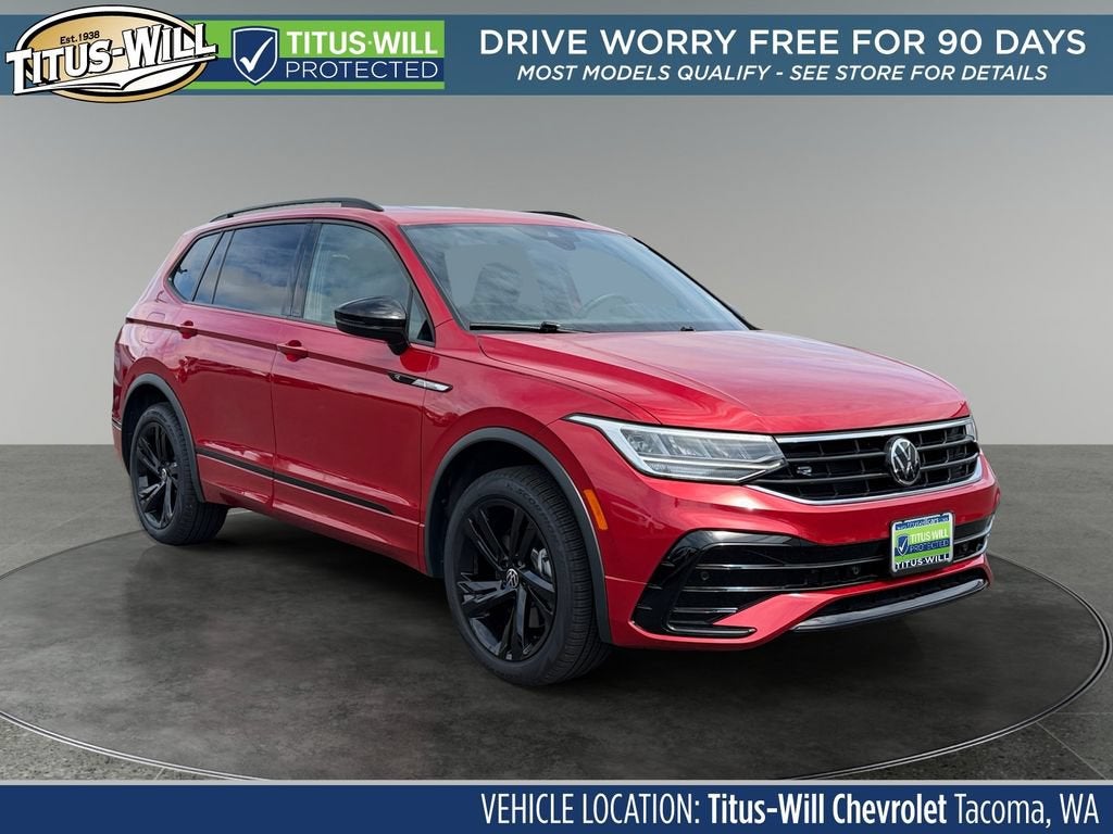 2024 Volkswagen Tiguan 2.0T SE R-Line Black in Red — front three-quarter view