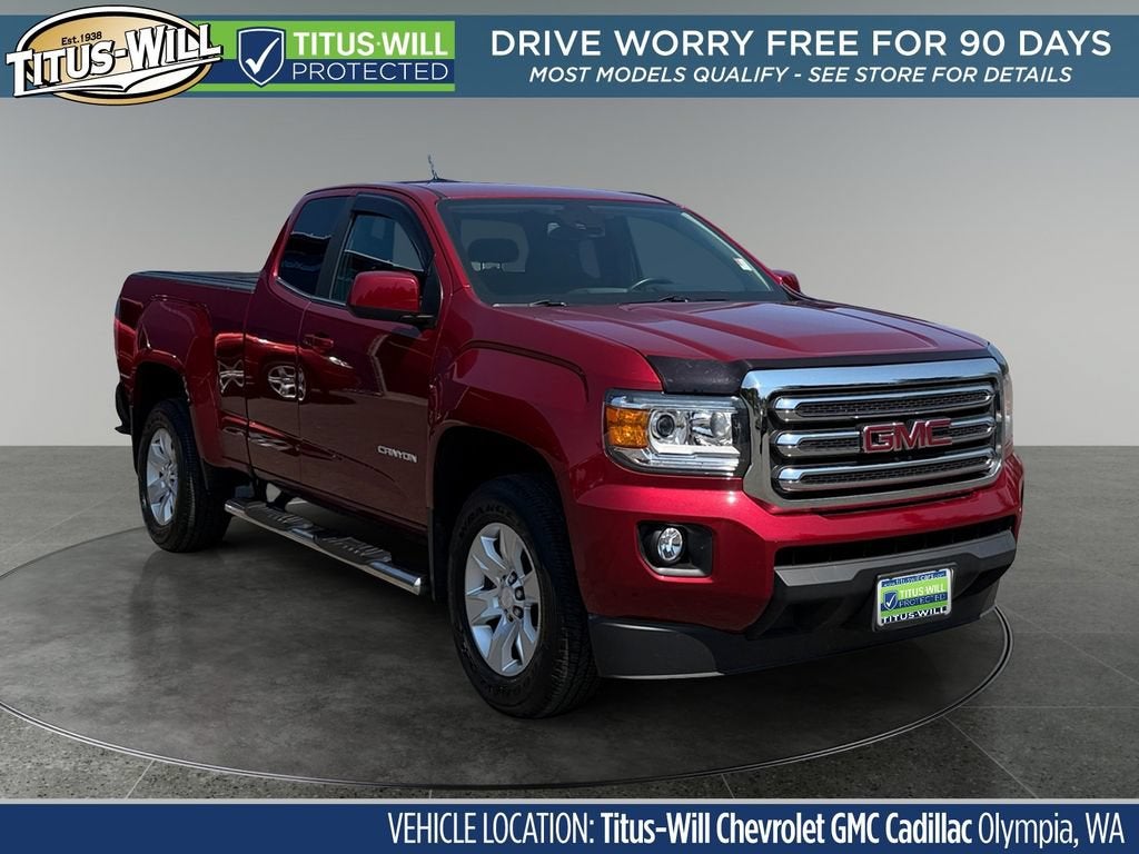 2017 GMC Canyon 2WD SLE in Red Quartz Tintcoat — front three-quarter view