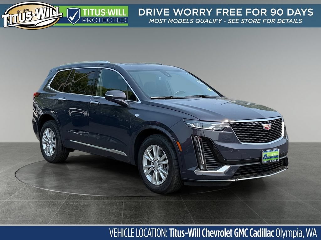 2025 Cadillac XT6 Luxury in Midnight Sky Metallic — front three-quarter view