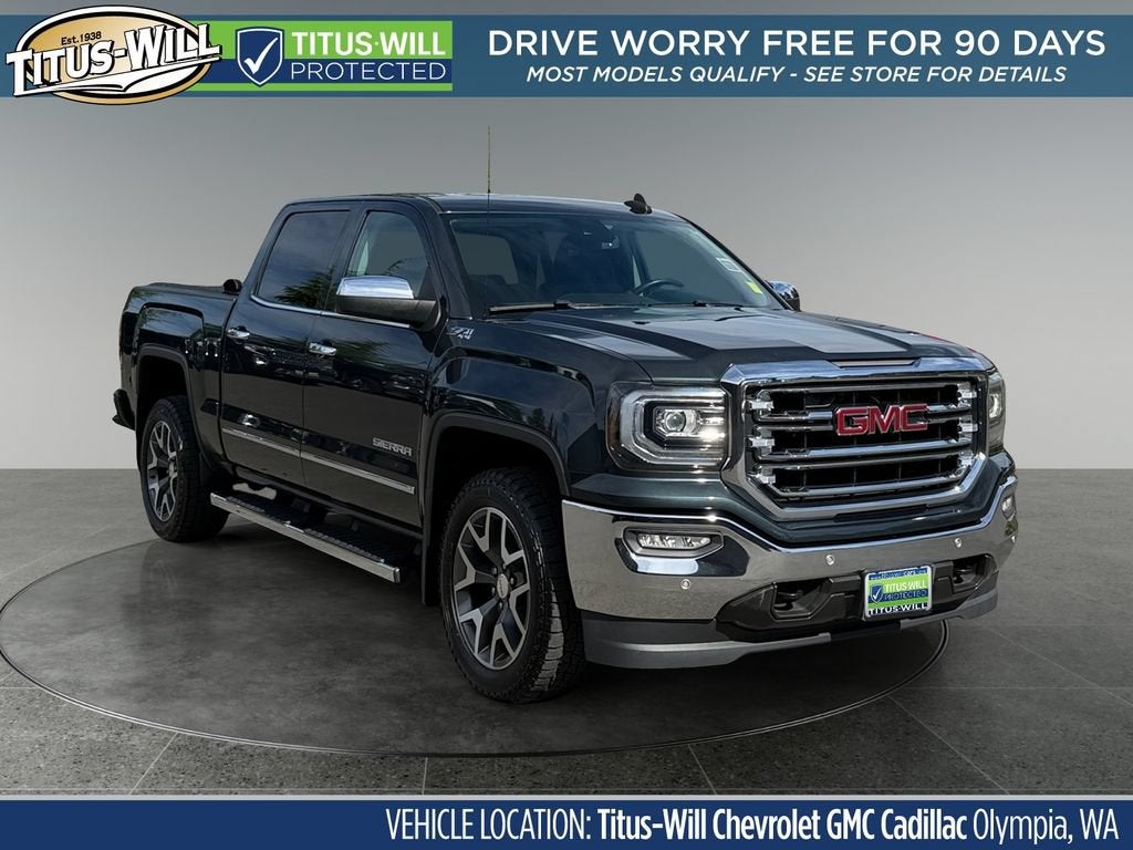2017 GMC Sierra 1500 SLT in Dark Slate Metallic — front three-quarter view