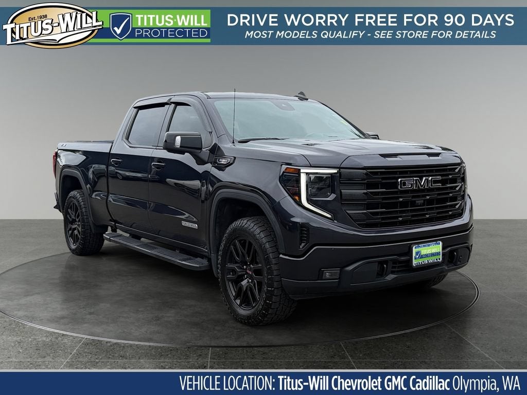 2022 GMC Sierra 1500 Elevation in Titanium Rush Metallic — front three-quarter view