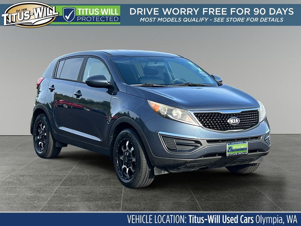 2015 Kia Sportage LX in Twilight Blue — front three-quarter view