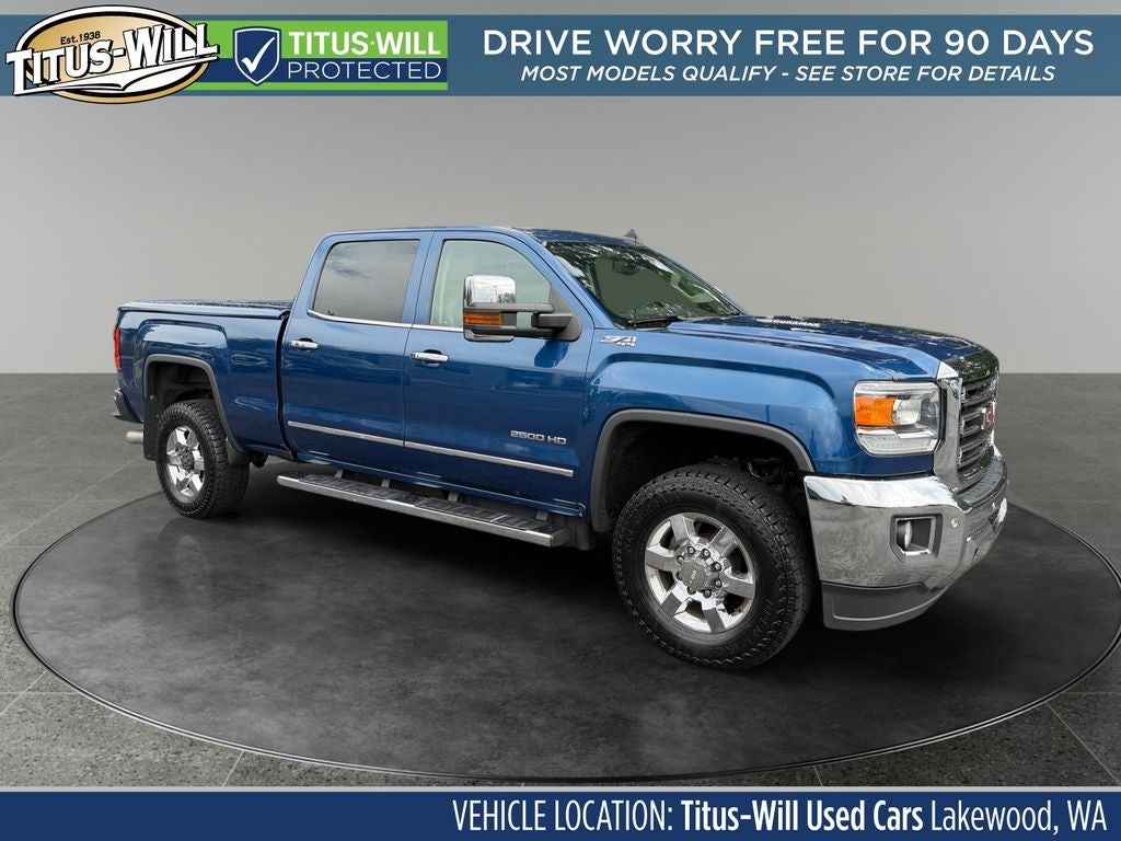 2016 GMC Sierra 2500HD SLT in Blue Metallic — front three-quarter view
