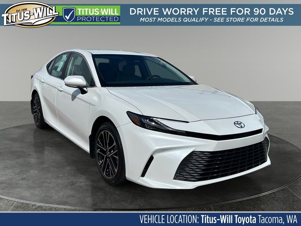 2026 Toyota Camry XLE in Platinum White Pearl Mc. — front three-quarter view