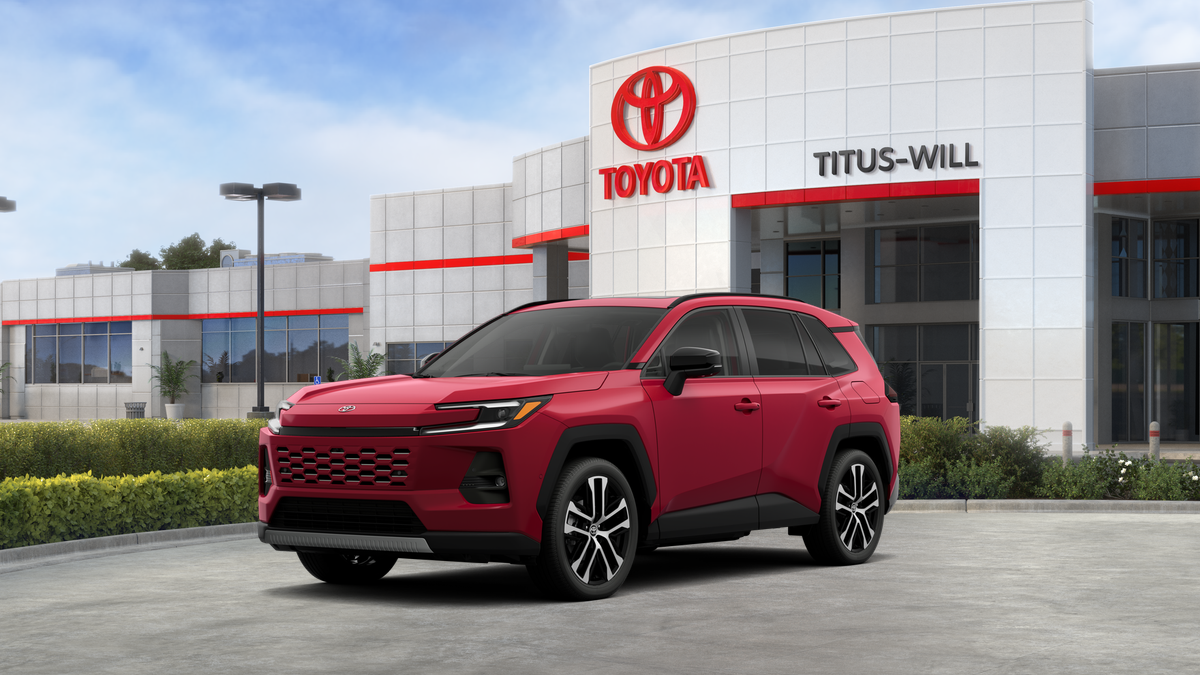 2026 Toyota RAV4 Limited in Ruby Flare Pearl — front three-quarter view