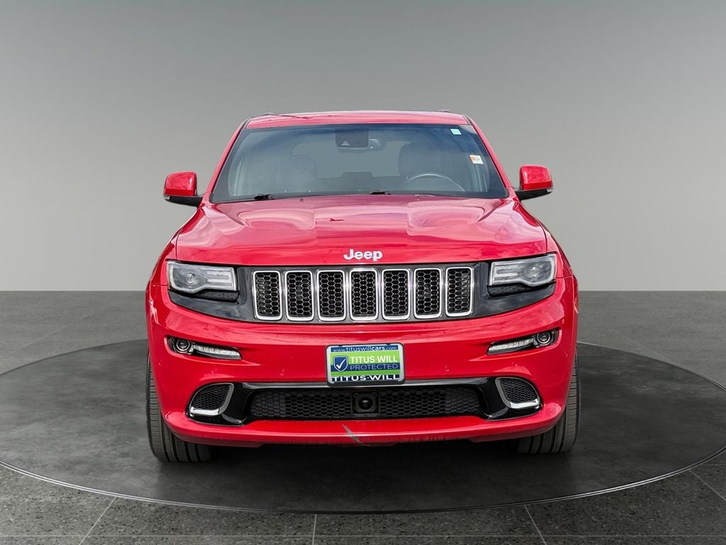 2014 Jeep Grand Cherokee — side profile view