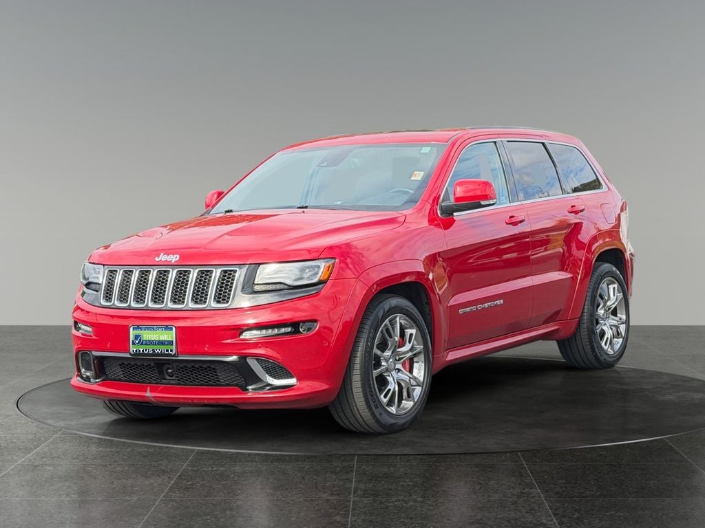 2014 Jeep Grand Cherokee — rear three-quarter view