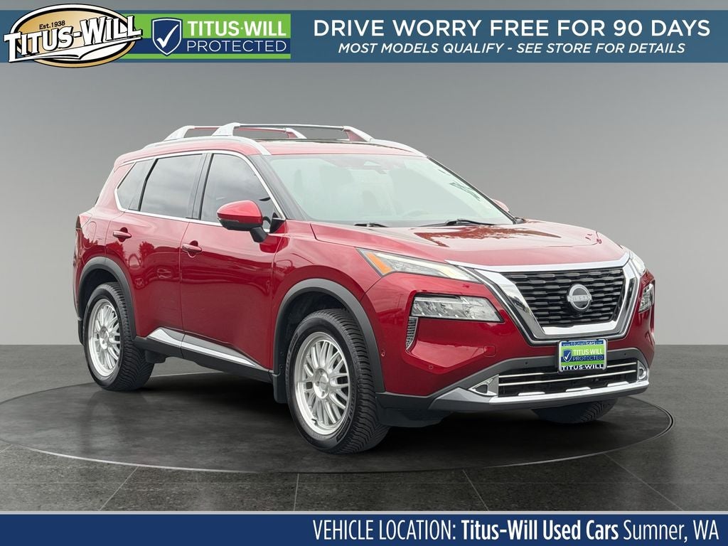 2023 Nissan Rogue SL in Scarlet — front three-quarter view